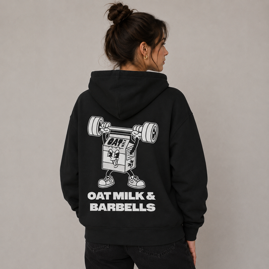 Black Hoodie Backprint – Oat Milk Cartoon Mascot with Barbells. Vegan Gains Streetwear by Vegan Lifting Club