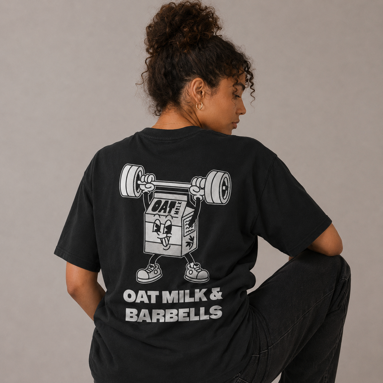 Black Oversized T-Shirt Backprint – Oat Milk Cartoon Mascot with Barbells. Vegan Gains Streetwear by Vegan Lifting Club
